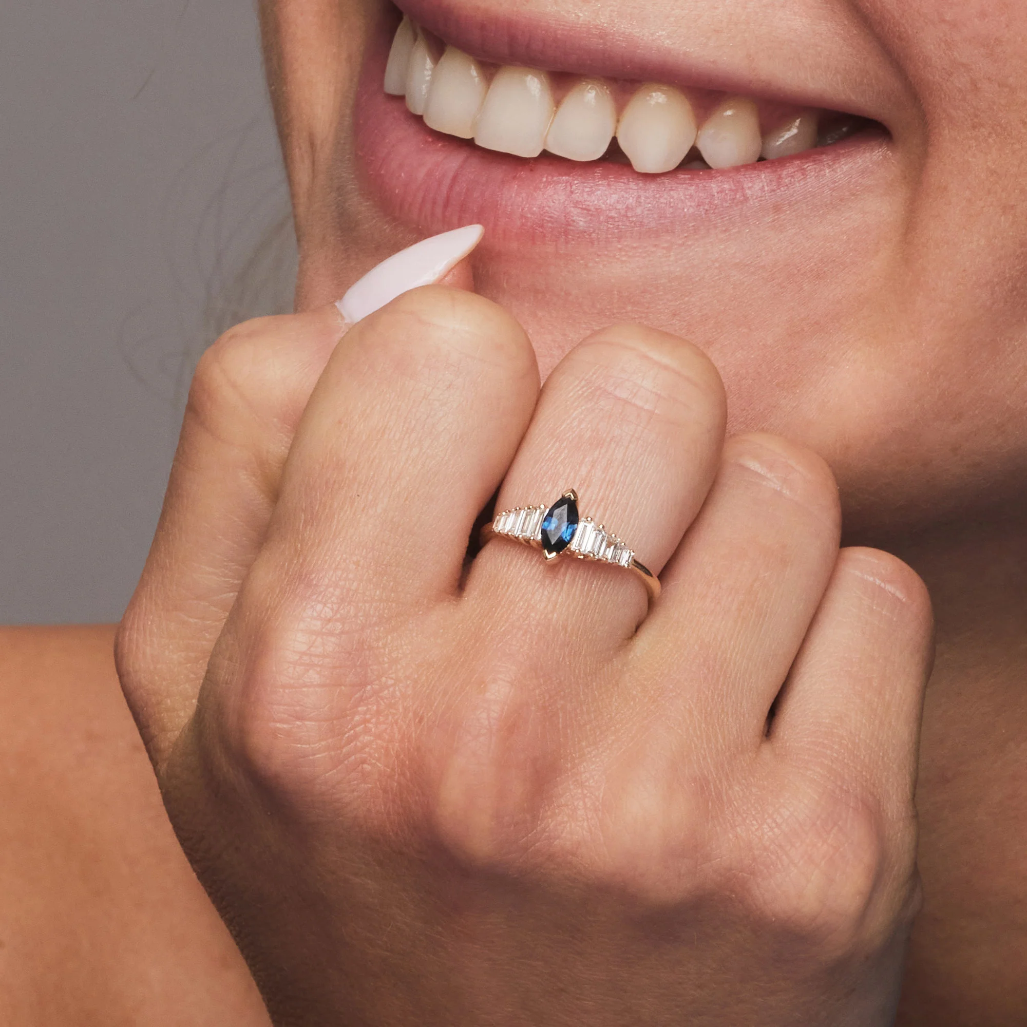 14k Gold Marquise Shape Sapphire Ring with Baguette Accents - Image 2