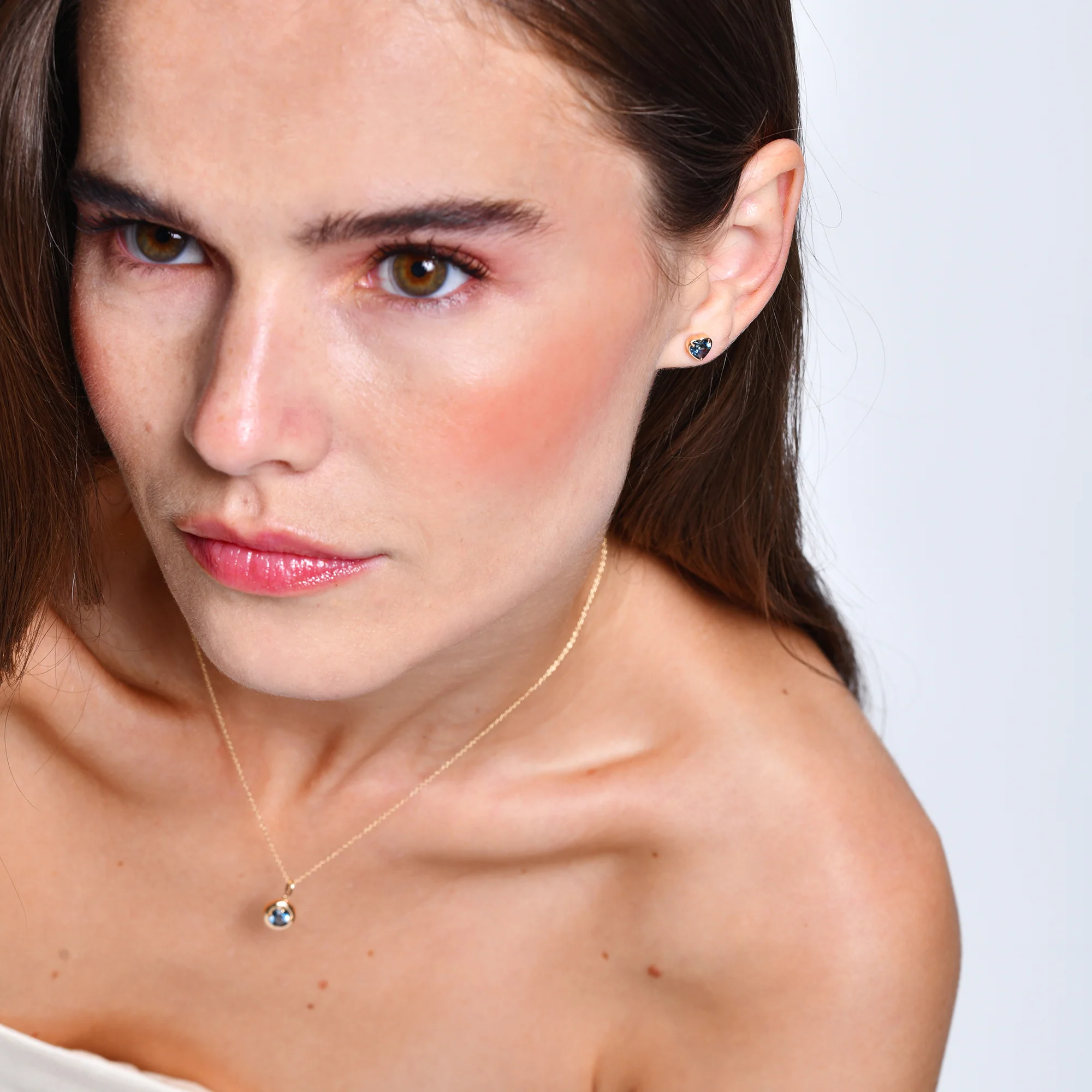 14K Heart Shaped London Blue Topaz Stud Earrings - Image 4