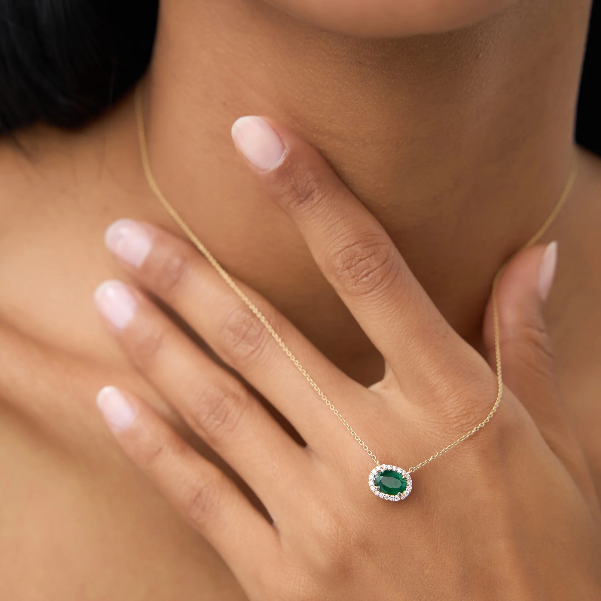 14k Oval Shape Emerald in Diamond Halo Setting - Image 2